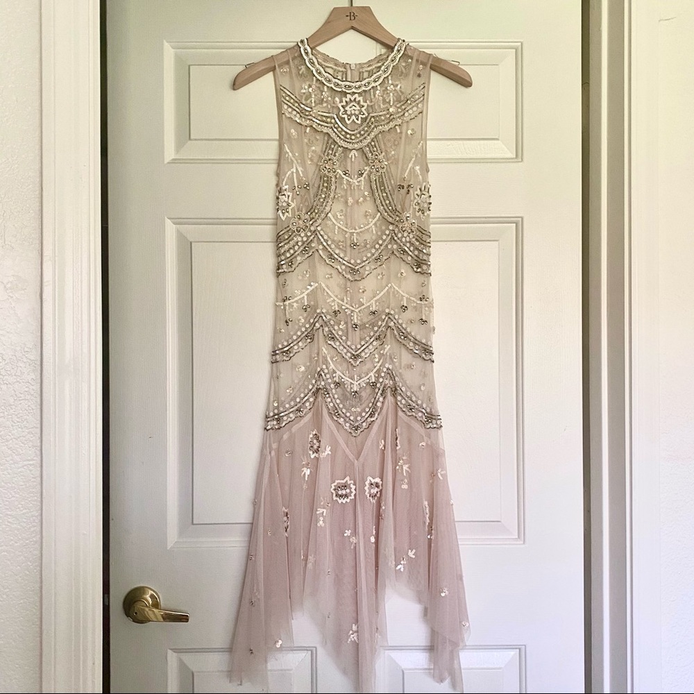 Beaded cream and blush overlay gown